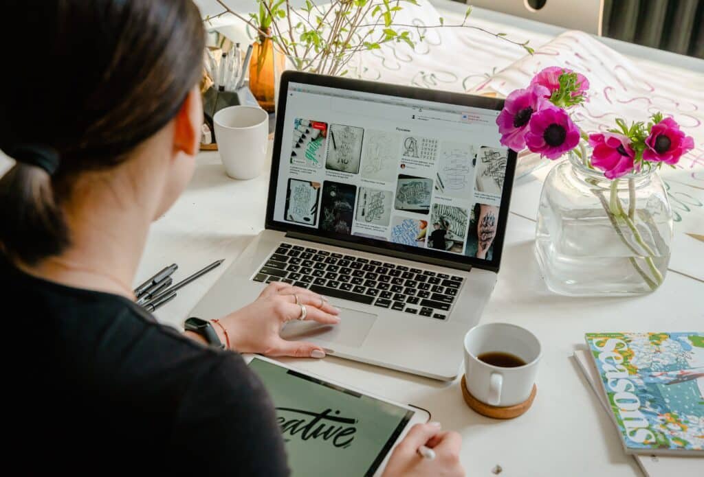 Person Using Laptop For Graphic Designs Person Using Laptop For Graphic Designs