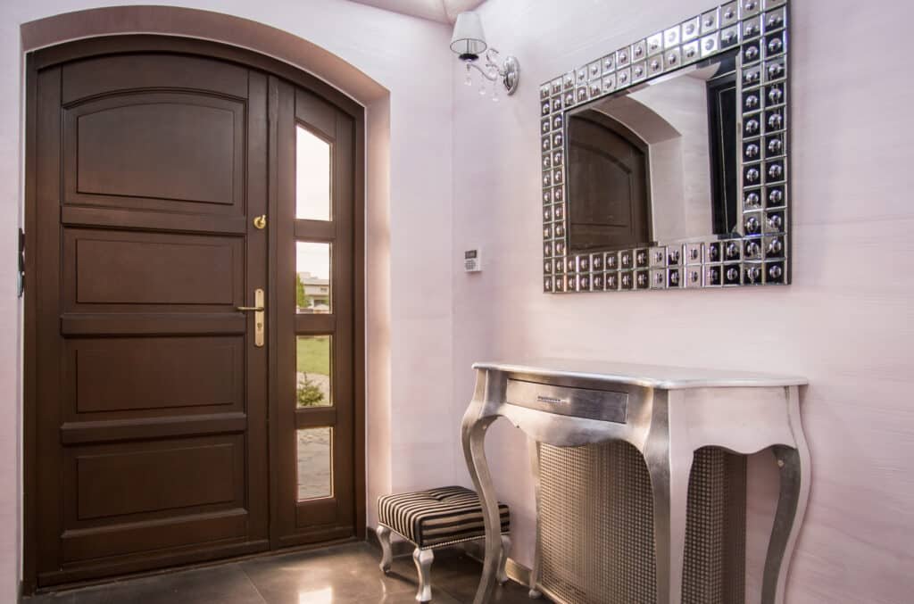 Home hall with decorative mirror Home hall with decorative mirror