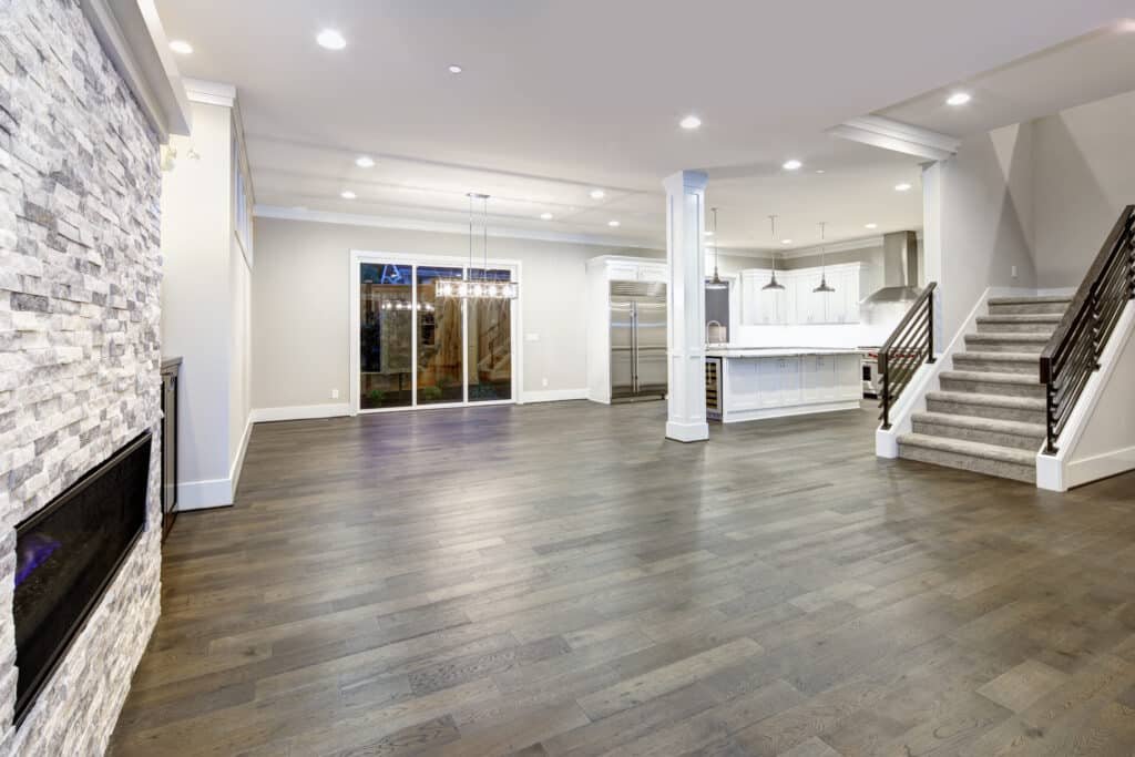 Living room with stone fireplace ceiling with recessed lightening Living room with stone fireplace ceiling with recessed lightening