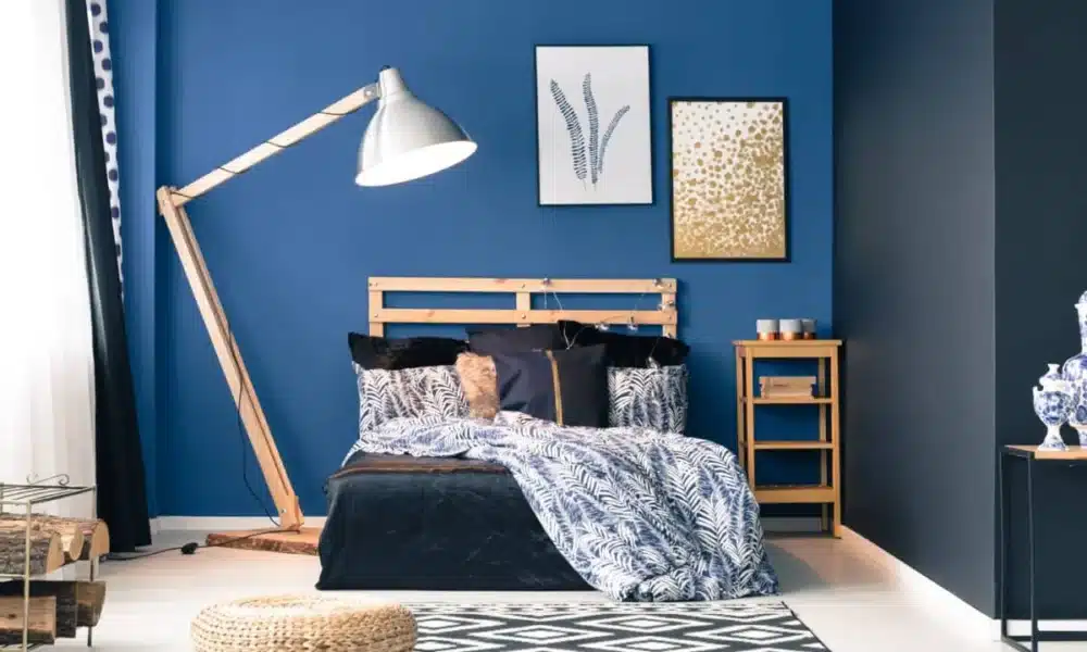 Navy and dark blue master bedroom with rug 1200x800 1