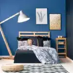 Navy and dark blue master bedroom with rug 1200x800 1