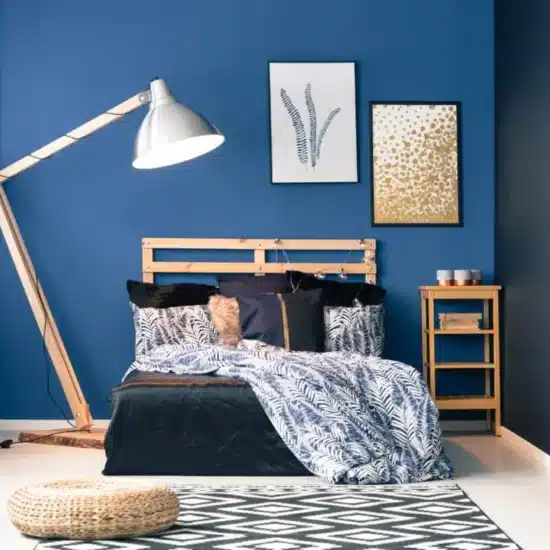 Navy and dark blue master bedroom with rug 1200x800 1