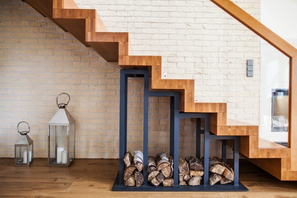 Solution to storage pile of wood under the stairs Solution to storage pile of wood under the stairs
