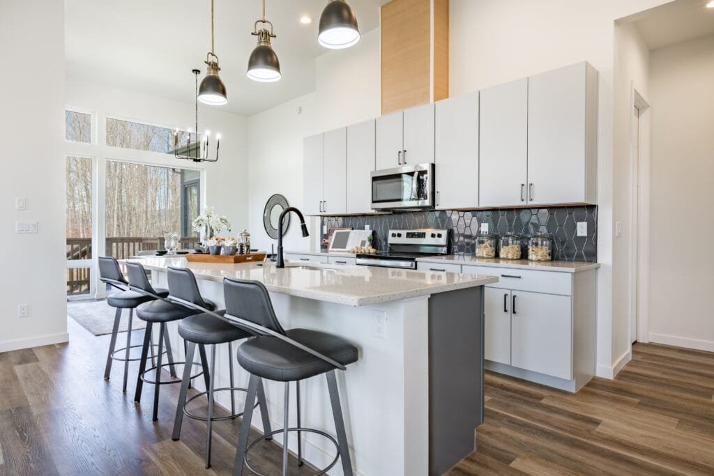 Large working chefs kitchen with a microwave above range