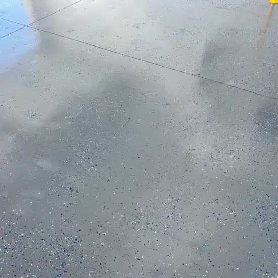 A gray epoxy finish sprinkled with blue scaled