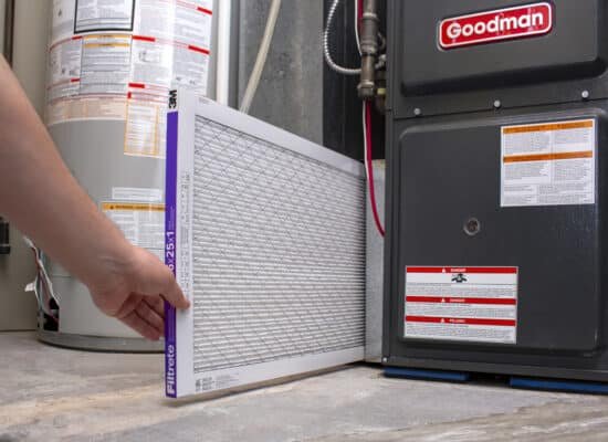 Changing an clean air filter in the furnace