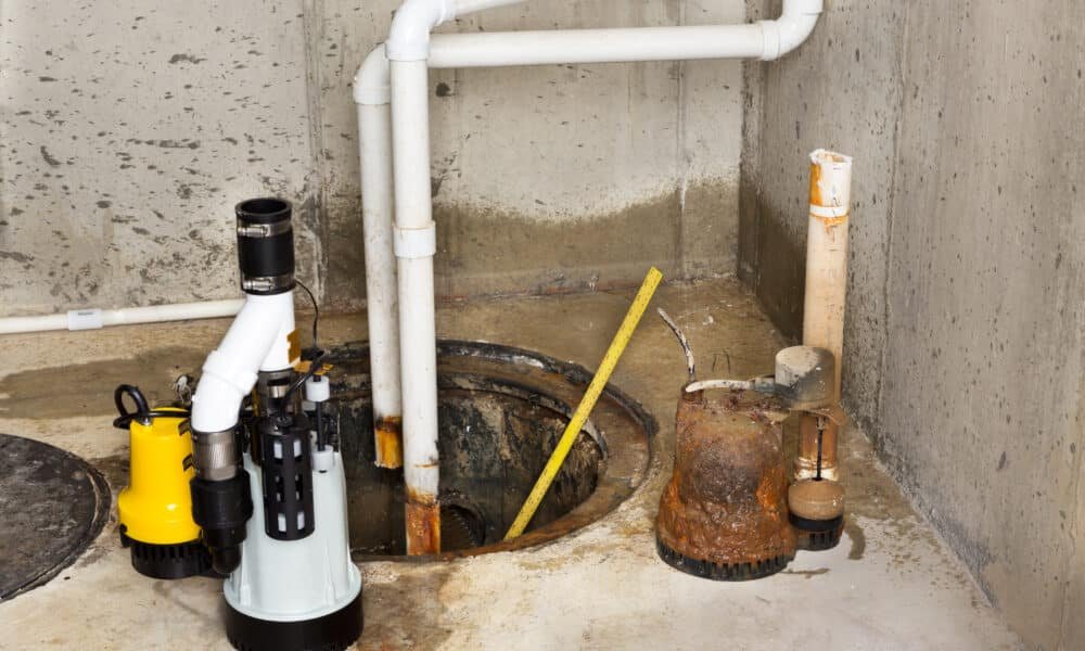 Replacing the old sump pump in a basement